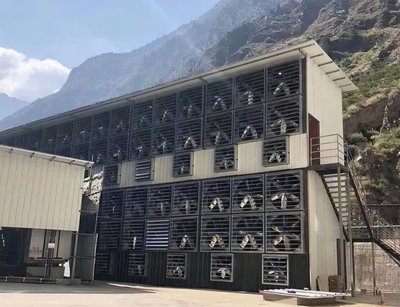 A aerial view of a German mining farm utilizing wind energy for hosting various crypto miners
